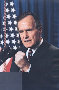 President George H.W. Bush, fist clenched, ready to smack down the Vietnam Syndrome